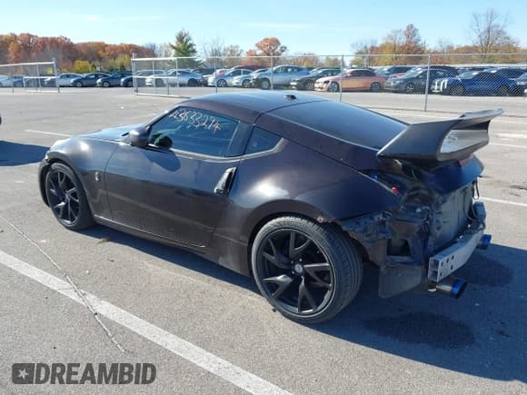 ✅ 2013 Nissan 370Z • VIN: JN1AZ4EH8DM880530 • Lot: 43633294. Listed on IAAI with 150,232 mi. Free auction sales archive from the USA and detailed vehicle history report at DreamBid. Image 3.