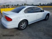 ✅ 2000 Oldsmobile Alero GL2 • VIN: 1G3NL52T2YC414778 • Lot: 42749090. Listed on IAAI with 170,151 mi. Free auction sales archive from the USA and detailed vehicle history report at DreamBid. Image 4.