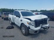 ✅ 2017 Nissan Titan SV • VIN: 1N6AA1C59HN576258 • Lot: 42578179. Listed on IAAI with 98,297 mi. Free auction sales archive from the USA and detailed vehicle history report at DreamBid. Image 1.