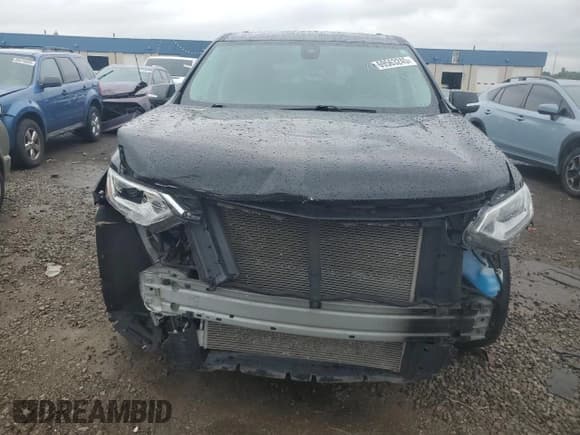 ✅ 2021 Chevrolet Traverse LT • VIN: 1GNERHKW0MJ176646 • Lot: 69563245. Wystawiony na Copart z przebiegiem 56 975 mil. Bezpłatny archiwum sprzedaży aukcyjnych z USA i szczegółowy raport historii pojazdu na DreamBid. Zdjęcie 5.
