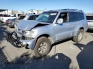 ✅ 2004 Mitsubishi Montero Limited • VIN: JA4MW51S74J010242 • Lot: 89154515. Listed on Copart with 200,044 mi. Free auction sales archive from the USA and detailed vehicle history report at DreamBid. Image 1.