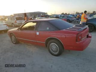 ✅ 1989 Oldsmobile Cutlass • VIN: 1G3WH14W0KD355432 • Lot: 78787204. Listed on Copart with Not provided. Free auction sales archive from the USA and detailed vehicle history report at DreamBid. Image 2.