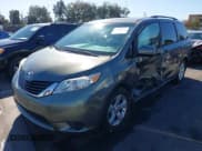 ✅ 2014 Toyota Sienna LE • VIN: 5TDKK3DC5ES458775 • Lot: 43588211. Listed on IAAI with 72,262 mi. Free auction sales archive from the USA and detailed vehicle history report at DreamBid. Image 2.