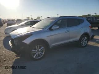 ✅ 2014 Hyundai Santa Fe • VIN: 5XYZWDLA0EG206843 • Лот: 69777515. Опубликован ранее на Copart с пробегом 130 793 миль. Бесплатный доступ к архиву аукционных продаж из США и подробный отчёт об истории автомобиля на DreamBid. Изображение 1.