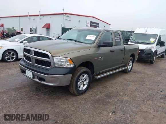 2015 Ram 1500 Express with VIN 1C6RR7FTXFS557414, listed as a IAAI auction lot 41453595 with 267,801 mi miles and . Bid and sale history available at DreamBid. Image 2.