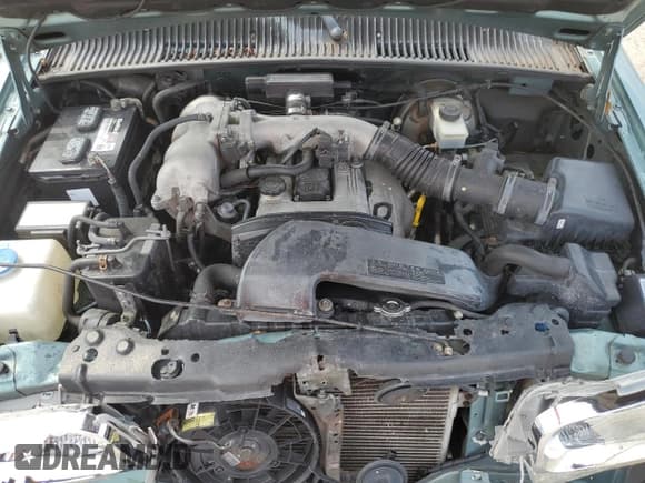 ✅ 2000 Kia Sportage • VIN: KNDJB7235Y5683827 • Lot: 71767285. Listed on Copart with 94,291 mi. Free auction sales archive from the USA and detailed vehicle history report at DreamBid. Image 12.