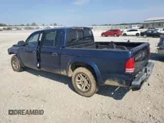 2003 Dodge Dakota Sport z VIN 1D7HL38X33S319159, wystawiony jako Copart lot #69791754 z przebiegiem 214 326 mil mil oraz Szkoda całkowita • Salvage title. Historia ofert i sprzedaży dostępna na DreamBid. Obrazek 2.