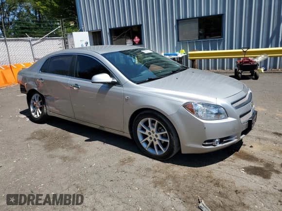 ✅ 2008 Chevrolet Malibu LTZ • VIN: 1G1ZK57718F278408 • Lot: 64233725. Listed on Copart with 102,840 mi. Free auction sales archive from the USA and detailed vehicle history report at DreamBid. Image 4.