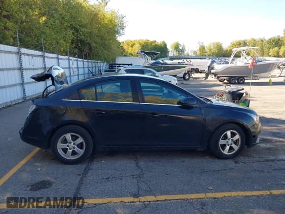 2012 Chevrolet Cruze 1LT z VIN 1G1PF5SC2C7387396, wystawiony jako IAAI lot #43401730 z przebiegiem 137 692 mil mil oraz . Historia ofert i sprzedaży dostępna na DreamBid. Obrazek 14.