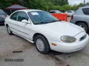 ✅ 1997 Mercury Sable GS • VIN: 1MELM50U7VA618028 • Lot: 42623487. Wystawiony na IAAI z przebiegiem 86 728 mil. Bezpłatny archiwum sprzedaży aukcyjnych z USA i szczegółowy raport historii pojazdu na DreamBid. Zdjęcie 1.