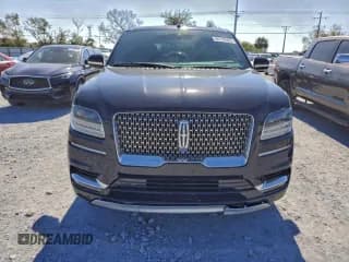 ✅ 2021 Lincoln Navigator Reserve • VIN: 5LMJJ3KT7MEL02851 • Lot: 94116995. Wystawiony na Copart z przebiegiem 142 376 mil. Bezpłatny archiwum sprzedaży aukcyjnych z USA i szczegółowy raport historii pojazdu na DreamBid. Zdjęcie 5.