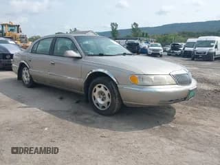 ✅ 1999 Lincoln Continental • VIN: 1LNHM97V2XY629957 • Lot: 43121475. Wystawiony na IAAI z przebiegiem 151 659 mil. Bezpłatny archiwum sprzedaży aukcyjnych z USA i szczegółowy raport historii pojazdu na DreamBid. Zdjęcie 1.