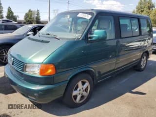 ✅ 2003 Volkswagen EuroVan GLS • VIN: WV2KB47043H001319 • Лот: 73758024. Опубликован ранее на Copart с пробегом 88 497 миль. Бесплатный доступ к архиву аукционных продаж из США и подробный отчёт об истории автомобиля на DreamBid. Изображение 1.