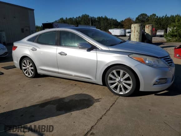 2014 Hyundai Azera Limited z VIN KMHFH4JG3EA360317, wystawiony jako Copart lot #79748564 z przebiegiem Nie podano mil oraz Szkoda całkowita • Salvage title. Historia ofert i sprzedaży dostępna na DreamBid. Obrazek 4.