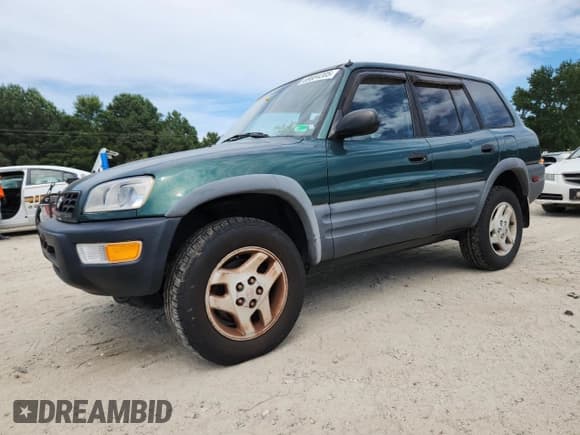 ✅ 1998 Toyota RAV4 • VIN: JT3HP10VXW7081514 • Lot: 69084205. Listed on Copart with 307,330 mi. Free auction sales archive from the USA and detailed vehicle history report at DreamBid. Image 1.