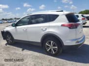 ✅ 2018 Toyota RAV4 XLE • VIN: JTMWFREVXJD127480 • Lot: 61004625. Listed on Copart with 33,179 mi. Free auction sales archive from the USA and detailed vehicle history report at DreamBid. Image 2.