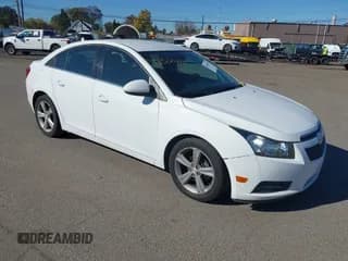 ✅ 2014 Chevrolet Cruze 2LT • VIN: 1G1PE5SB2E7302621 • Lot: 43500103. Listed on IAAI with 143,243 mi. Free auction sales archive from the USA and detailed vehicle history report at DreamBid. Image 1.
