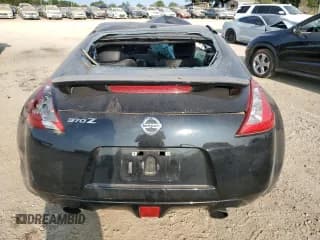 ✅ 2014 Nissan 370Z • VIN: JN1AZ4EH8EM636507 • Лот: 70607724. Опубликован ранее на Copart с пробегом Не указан. Бесплатный доступ к архиву аукционных продаж из США и подробный отчёт об истории автомобиля на DreamBid. Изображение 6.