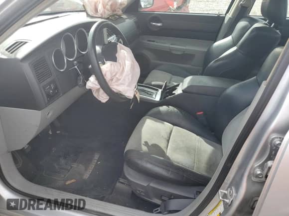 2007 Dodge Charger SRT-8 с VIN 2B3LA73W97H690826, выставлен на аукционе Copart как лот 71741044 с пробегом 175 071 миль миль и Списание • Salvage title. История ставок и продаж доступна на DreamBid. Изображение 7.