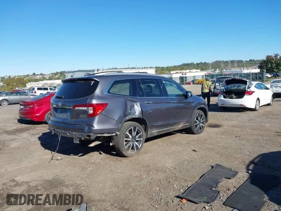 ✅ 2019 Honda Pilot Touring 7-Passenger • VIN: 5FNYF6H60KB088890 • Lot: 43458400. Listed on IAAI with 72,877 mi. Free auction sales archive from the USA and detailed vehicle history report at DreamBid. Image 4.