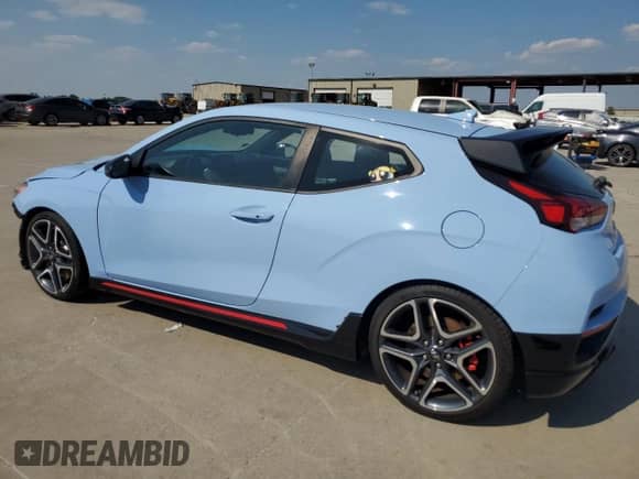 2020 Hyundai Veloster with VIN KMHT36AH4LU005013, listed as a Copart auction lot 65927394 with 84,972 mi miles and Salvage title. Bid and sale history available at DreamBid. Image 2.