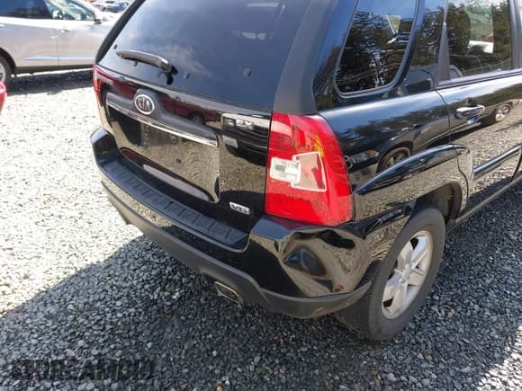 ✅ 2009 Kia Sportage EX • VIN: KNDJF723497581817 • Lot: 41867695. Listed on IAAI with 92,207 mi. Free auction sales archive from the USA and detailed vehicle history report at DreamBid. Image 6.