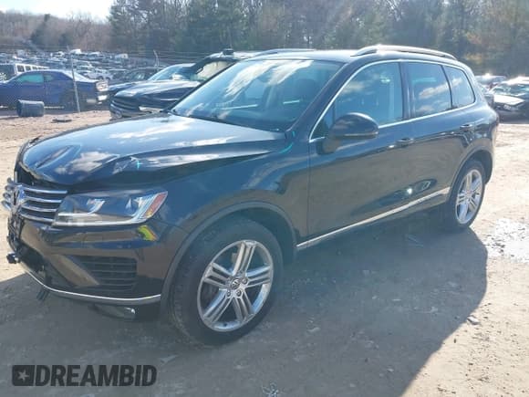 ✅ 2016 Volkswagen Touareg Lux • VIN: WVGEF9BP4GD001508 • Lot: 41850994. Wystawiony na IAAI z przebiegiem 63 355 mil. Bezpłatny archiwum sprzedaży aukcyjnych z USA i szczegółowy raport historii pojazdu na DreamBid. Zdjęcie 2.