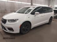 ✅ 2022 Chrysler Pacifica Hybrid Limited • VIN: 2C4RC1S77NR130000 • Lot: 43202744. Listed on IAAI with 143,911 mi. Free auction sales archive from the USA and detailed vehicle history report at DreamBid. Image 2.