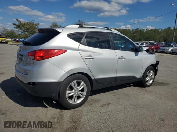 ✅ 2013 Hyundai Tucson GLS • VIN: KM8JUCAC2DU593793 • Lot: 84458635. Listed on Copart with 110,436 mi. Free auction sales archive from the USA and detailed vehicle history report at DreamBid. Image 3.