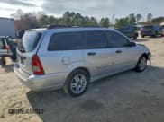 ✅ 2001 Ford Focus SE • VIN: 1FAHP36331W298095 • Lot: 94436855. Listed on Copart with 176,068 mi. Free auction sales archive from the USA and detailed vehicle history report at DreamBid. Image 3.