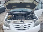 ✅ 2005 Mazda MPV LX • VIN: JM3LW28J650556302 • Лот: 41775254. Опубликован ранее на IAAI с пробегом 263 789 миль. Бесплатный доступ к архиву аукционных продаж из США и подробный отчёт об истории автомобиля на DreamBid. Изображение 10.