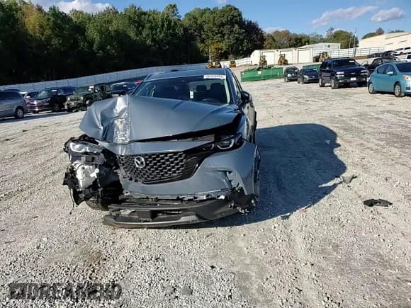 ✅ 2023 Mazda CX-50 S Preferred Plus • VIN: 7MMVABCM9PN112757 • Lot: 90320495. Listed on Copart with 57,072 mi. Free auction sales archive from the USA and detailed vehicle history report at DreamBid. Image 14.