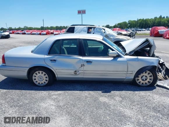 ✅ 2003 Ford Police Interceptor Street Appear • VIN: 2FAFP71W93X101292 • Lot: 40263949. Listed on IAAI with 255,111 mi. Free auction sales archive from the USA and detailed vehicle history report at DreamBid. Image 12.
