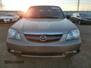 ✅ 2002 Mazda Tribute LX • VIN: 4F2YU09142KM22895 • Lot: 73797364. Wystawiony na Copart z przebiegiem 176 514 mil. Bezpłatny archiwum sprzedaży aukcyjnych z USA i szczegółowy raport historii pojazdu na DreamBid. Zdjęcie 5.