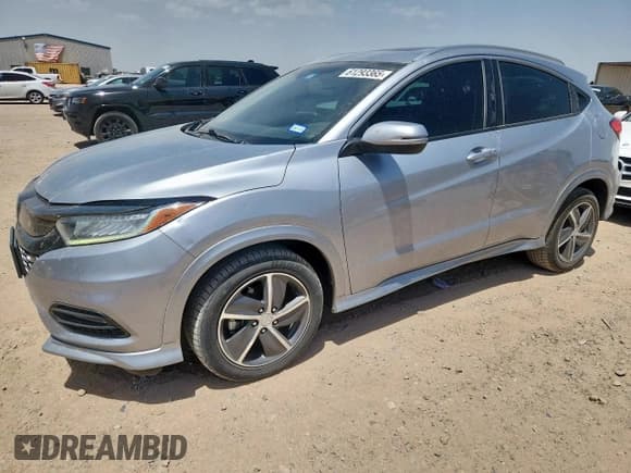 ✅ 2019 Honda HR-V Touring • VIN: 3CZRU6H94KM713902 • Лот: 61293365. Опубликован ранее на Copart с пробегом 80 286 миль. Бесплатный доступ к архиву аукционных продаж из США и подробный отчёт об истории автомобиля на DreamBid. Изображение 1.