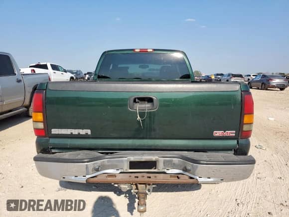 2004 GMC Sierra 1500 SLE with VIN 2GTEC19V641207813, listed as a Copart auction lot 71743215 with 208,365 mi miles and Salvage title. Bid and sale history available at DreamBid. Image 6.