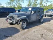 ✅ 2021 Jeep Wrangler Unlimited Willys • VIN: 1C4HJXDN9MW557345 • Лот: 43190776. Опубликован ранее на IAAI с пробегом 88 235 миль. Бесплатный доступ к архиву аукционных продаж из США и подробный отчёт об истории автомобиля на DreamBid. Изображение 2.