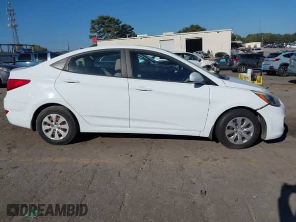 2016 Hyundai Accent SE z VIN KMHCT4AE8GU158848, wystawiony jako IAAI lot #43408709 z przebiegiem 144 380 mil mil oraz . Historia ofert i sprzedaży dostępna na DreamBid. Obrazek 13.