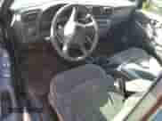 2001 Chevrolet Blazer LS с VIN 1GNCT18W91K189599, выставлен на аукционе Copart как лот 74595674 с пробегом 208 309 миль миль и Списание • Salvage title. История ставок и продаж доступна на DreamBid. Изображение 8.