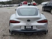 ✅ 2022 Toyota Supra 2.0 • VIN: WZ1DB2C09NW048380 • Lot: 87413024. Wystawiony na Copart z przebiegiem Nie podano. Bezpłatny archiwum sprzedaży aukcyjnych z USA i szczegółowy raport historii pojazdu na DreamBid. Zdjęcie 6.