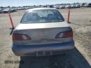 ✅ 1998 Toyota Corolla LE • VIN: 1NXBR18E5WZ099366 • Лот: 87099535. Опубликован ранее на Copart с пробегом 173 725 миль. Бесплатный доступ к архиву аукционных продаж из США и подробный отчёт об истории автомобиля на DreamBid. Изображение 6.