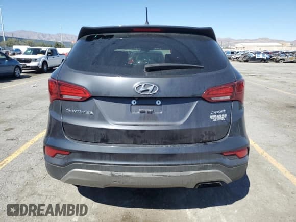 ✅ 2018 Hyundai Santa Fe 2.4L • VIN: 5XYZT3LB9JG523560 • Lot: 81779345. Listed on Copart with 106,399 mi. Free auction sales archive from the USA and detailed vehicle history report at DreamBid. Image 6.