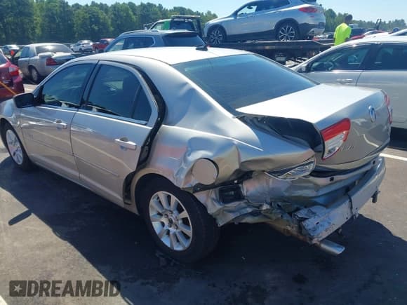 ✅ 2007 Mercury Milan • VIN: 3MEHM01167R632055 • Lot: 43094366. Listed on IAAI with 146,517 mi. Free auction sales archive from the USA and detailed vehicle history report at DreamBid. Image 19.