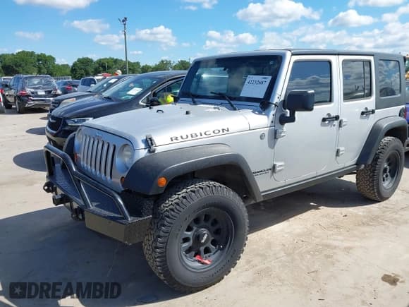 ✅ 2008 Jeep Wrangler Unlimited Rubicon • VIN: 1J4GA69178L550598 • Лот: 42232887. Опубликован ранее на IAAI с пробегом 99 637 миль. Бесплатный доступ к архиву аукционных продаж из США и подробный отчёт об истории автомобиля на DreamBid. Изображение 17.