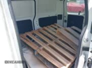 ✅ 2018 Nissan NV200 S • VIN: 3N6CM0KN2JK703858 • Lot: 42541493. Listed on IAAI with 64,503 mi. Free auction sales archive from the USA and detailed vehicle history report at DreamBid. Image 8.