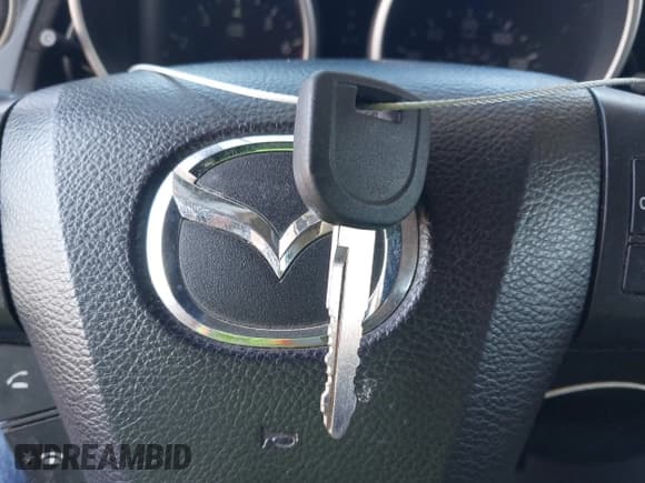 ✅ 2015 Mazda 5 Touring • VIN: JM1CW2CL3F0188986 • Lot: 42692787. Listed on IAAI with 124,697 mi. Free auction sales archive from the USA and detailed vehicle history report at DreamBid. Image 11.