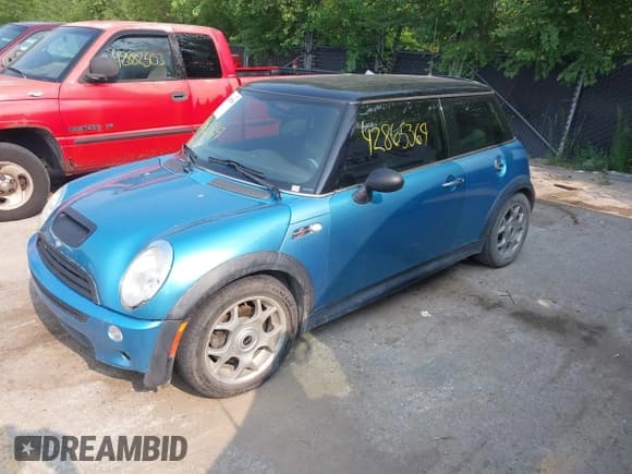 ✅ 2003 MINI Hardtop S • VIN: WMWRE33473TD70793 • Lot: 42865369. Listed on IAAI with 178,384 mi. Free auction sales archive from the USA and detailed vehicle history report at DreamBid. Image 2.