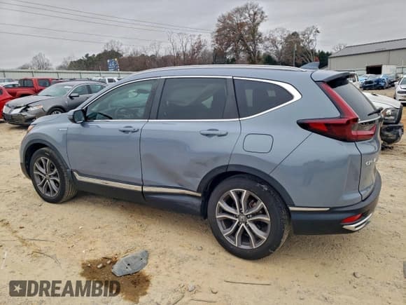 ✅ 2022 Honda CR-V Touring • VIN: 5J6RT6H98NL011252 • Lot: 93649295. Listed on Copart with 29,939 mi. Free auction sales archive from the USA and detailed vehicle history report at DreamBid. Image 2.