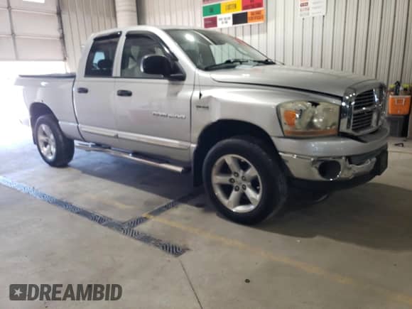 2006 Dodge 1500 SLT with VIN 1D7HU18286J139854, listed as a Copart auction lot 86801525 with 152,544 mi miles and Salvage title. Bid and sale history available at DreamBid. Image 4.