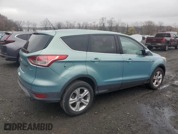 ✅ 2013 Ford Escape SE • VIN: 1FMCU9GX4DUD06461 • Lot: 91730445. Listed on Copart with 76,613 mi. Free auction sales archive from the USA and detailed vehicle history report at DreamBid. Image 3.